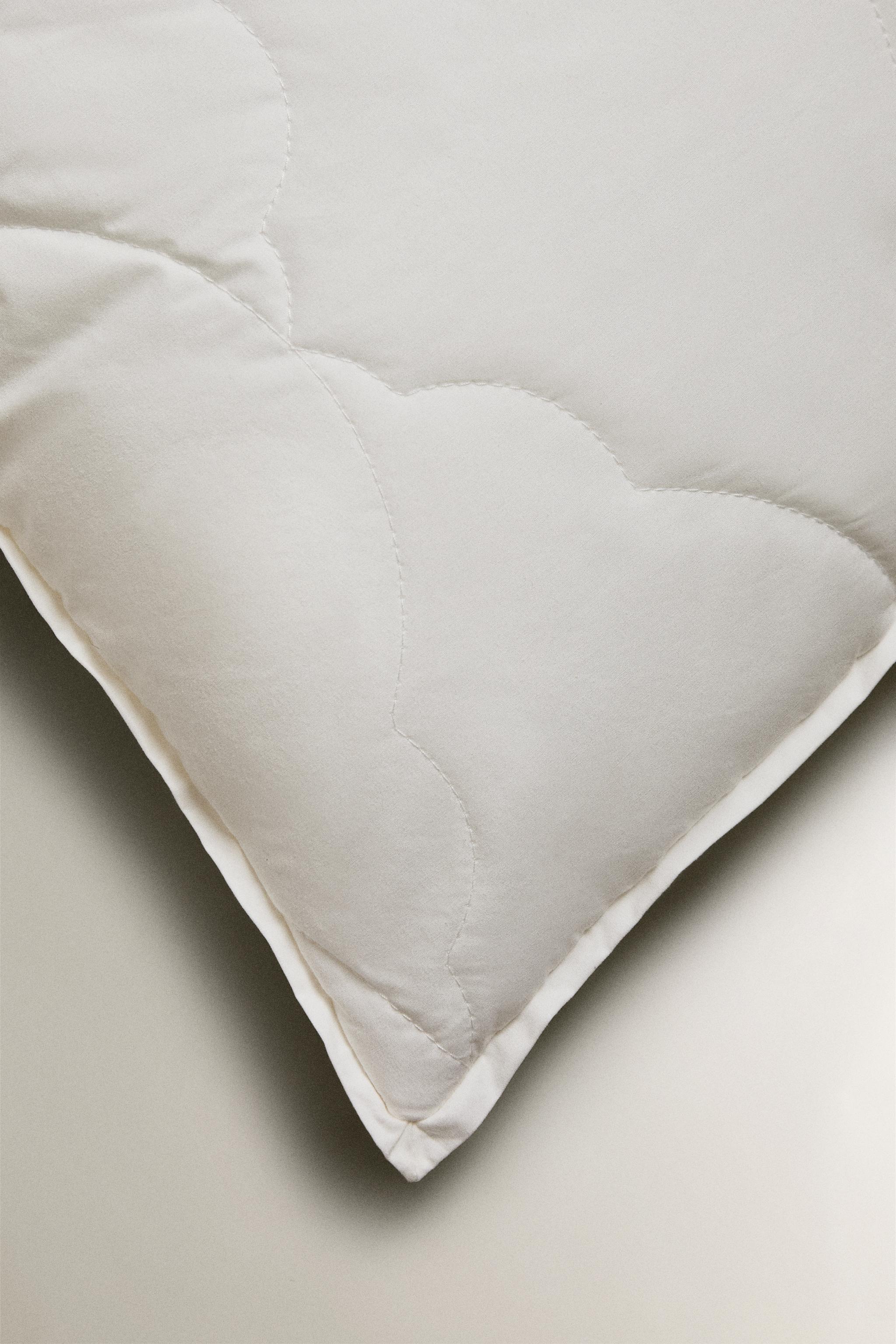 OREILLER ENFANT FIBRE MATELASSÉE EFFET DOUX